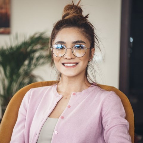 Professional Young Women In Glasses And Pink Jacket